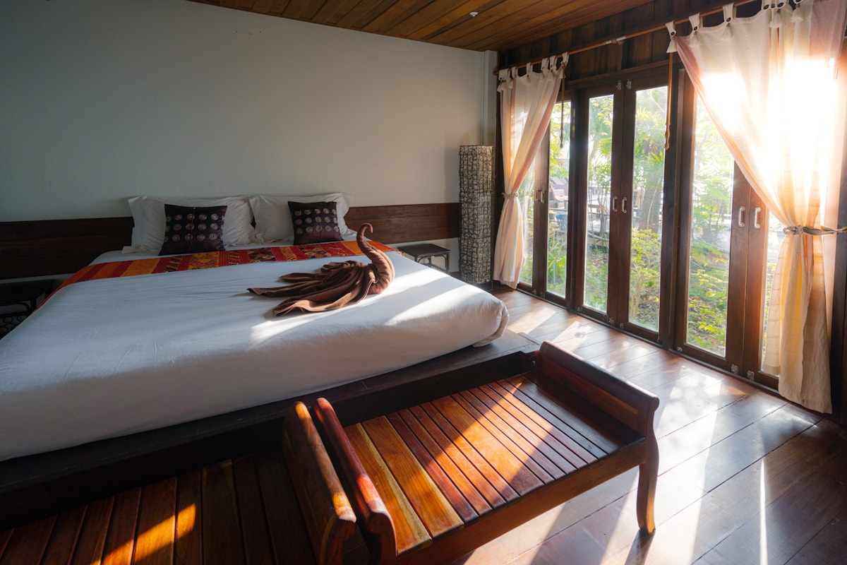 Luxury hotel suite with warm natural light — the kind of venue SURV professionals access